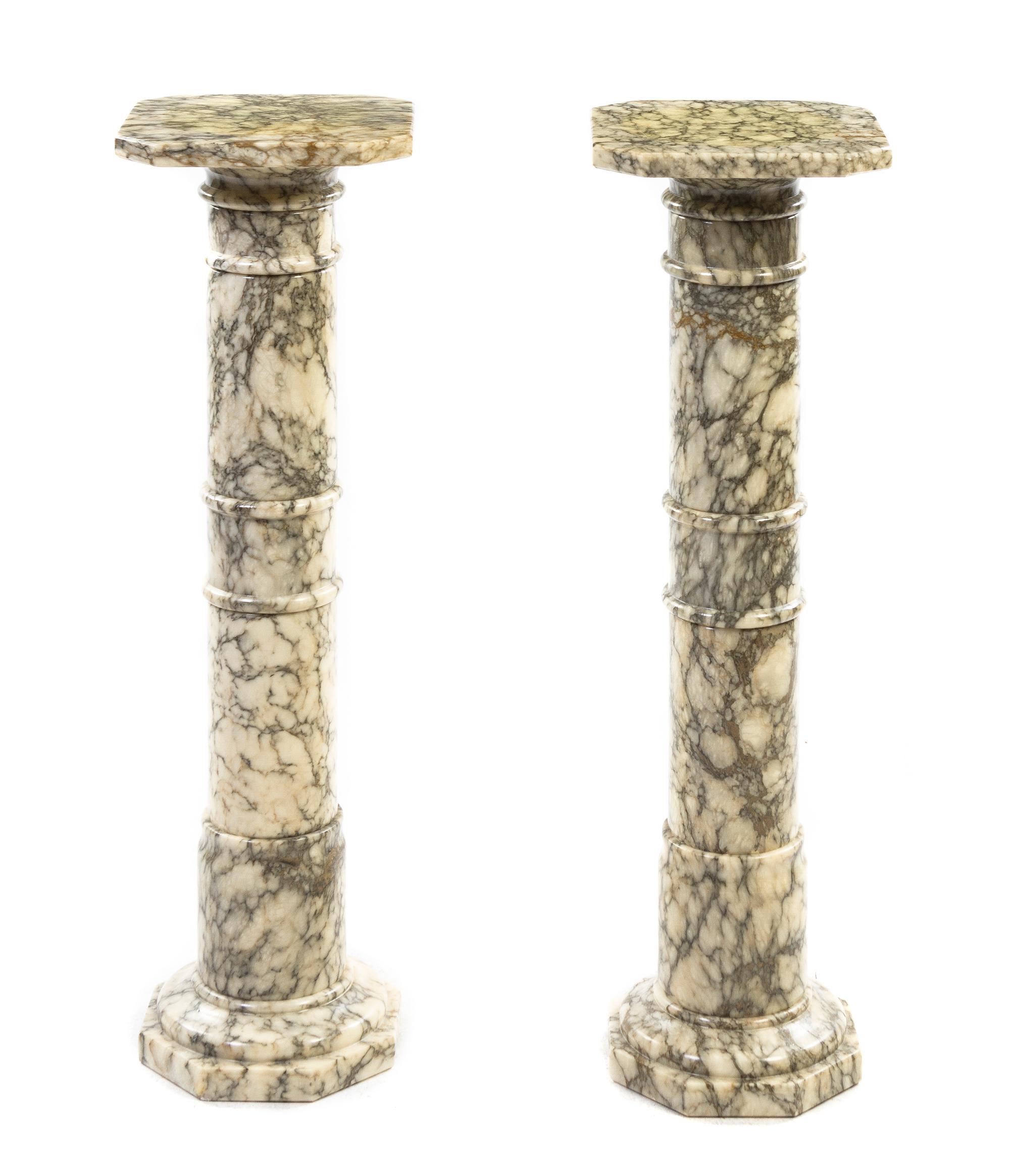 A Pair of Continental Marble Pedestals, Height 39 1/4 inches (each).