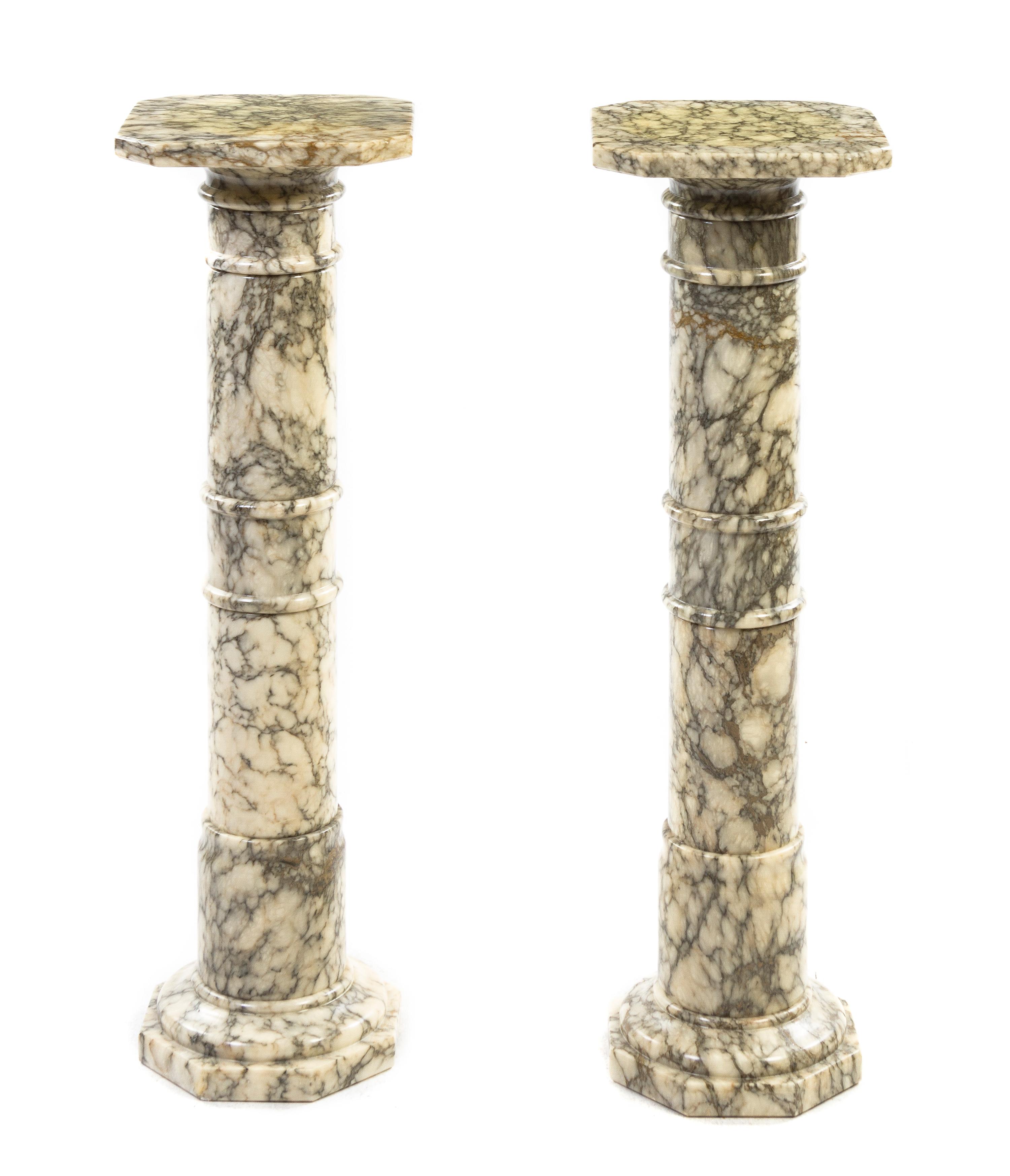 A Pair of Continental Marble Pedestals, Height 39 1/4 inches (each).