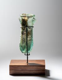 A Roman Pale Blue Glass Double Unguentarium