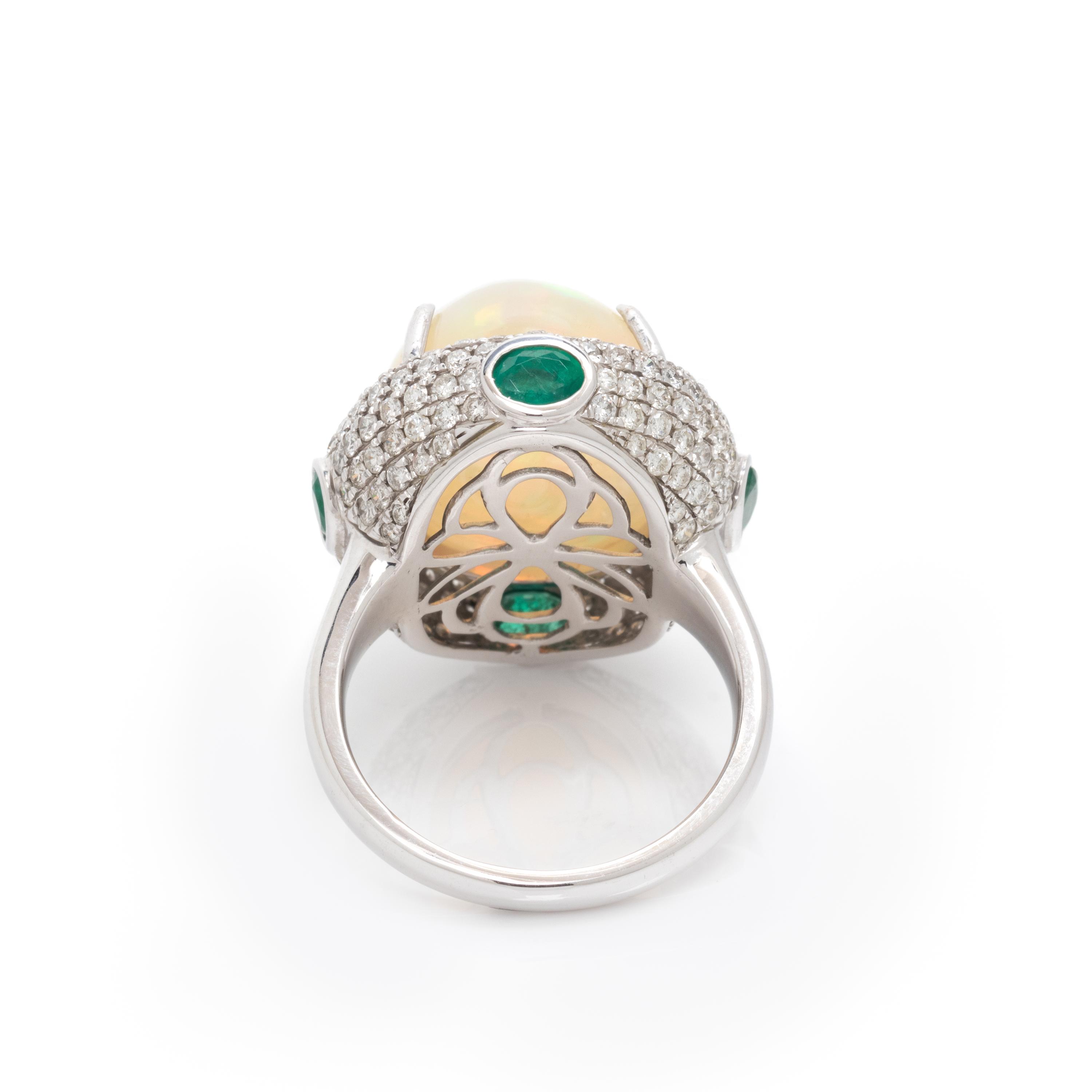 OPAL, DIAMOND AND EMERALD RING