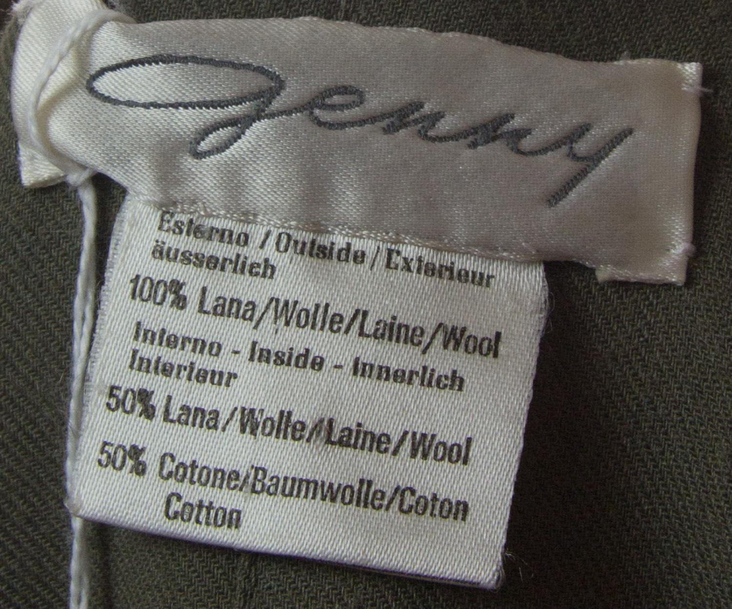 A Genny Olive Wool Pant Suit, Jacket size 6, pants size 8.