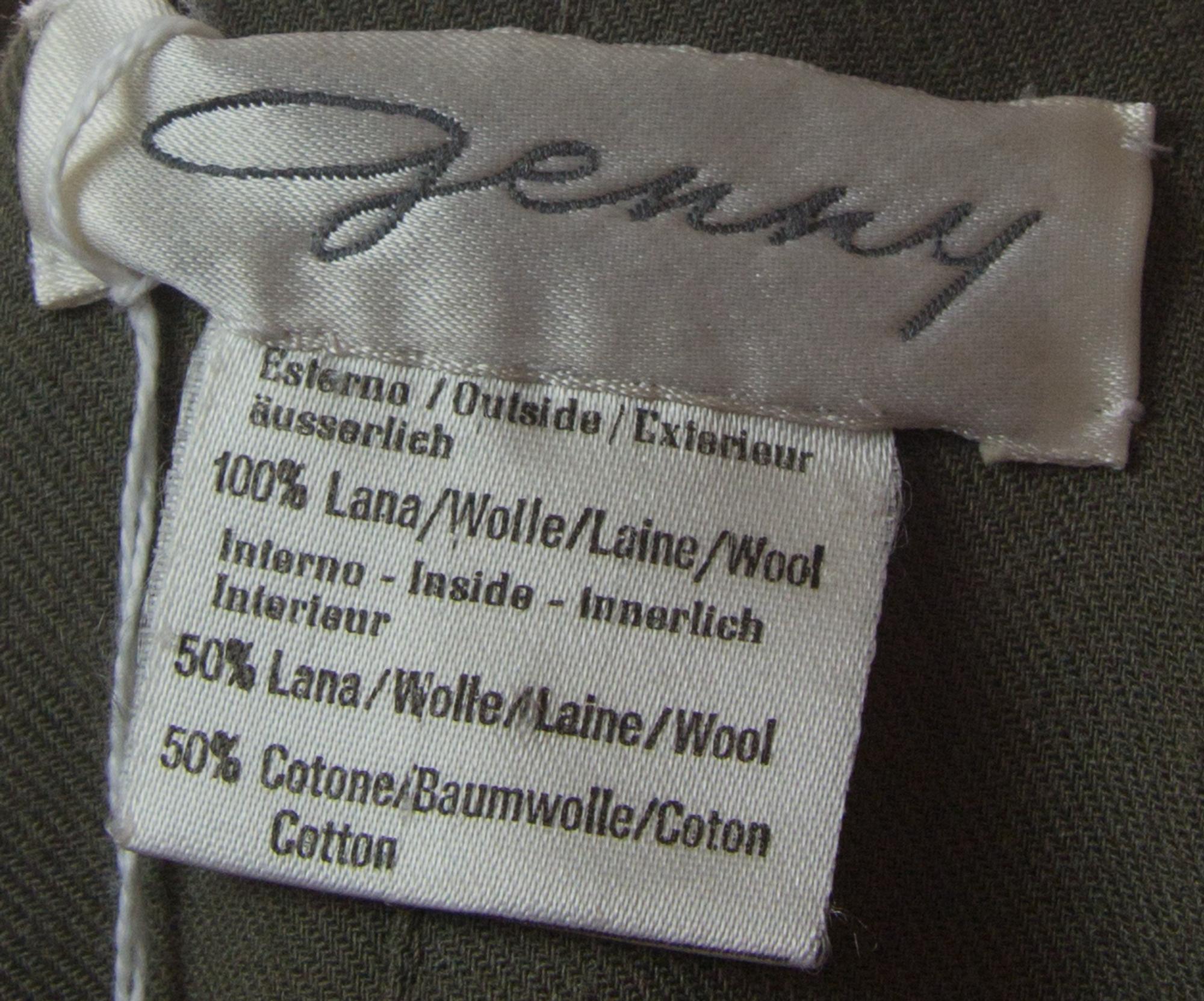 A Genny Olive Wool Pant Suit, Jacket size 6, pants size 8.