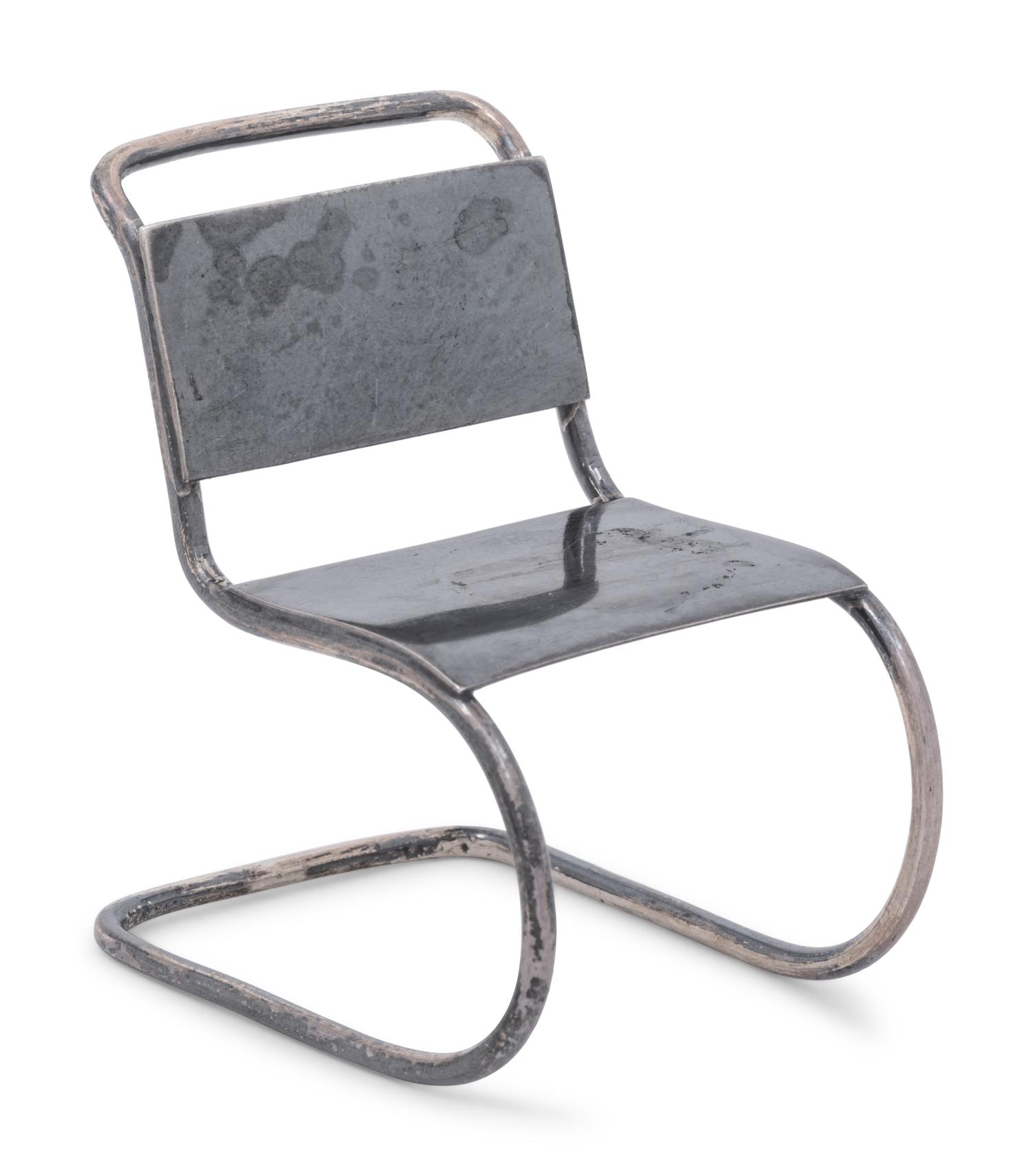 A Set of Three Silver Miniature Modernist Chairs