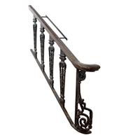 A Stair Railing from a Chicago Theater 58" W x 8" D x 59" H — United States, Early 20th Century