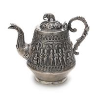 An Indian Silver Teapot Height 6 1/4 inches.