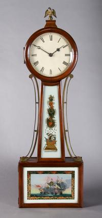An American Banjo Clock, Height 34 inches.
