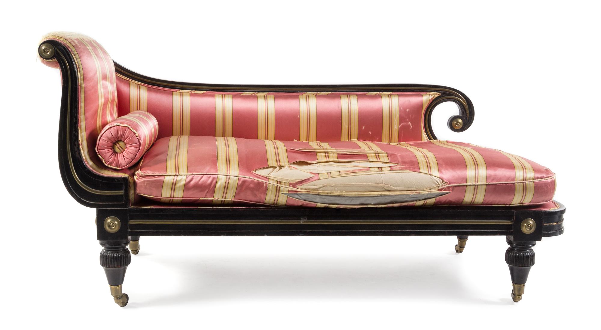 A Regency Brass Mounted Ebonized Chaise Longue Length 67 inches. — FIRST HALF 19TH CENTURY