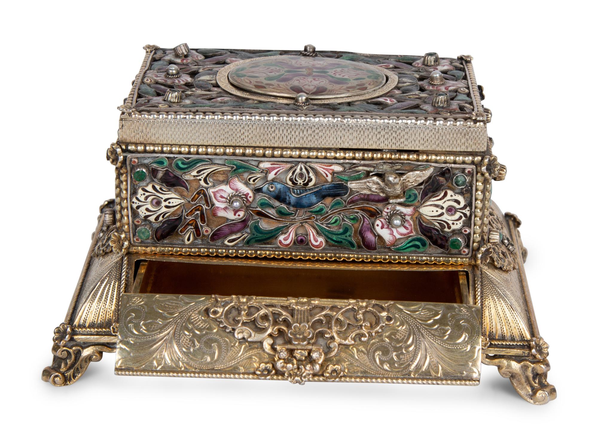 A Continental Enameled Silver Gilt Singing Bird Automaton Box — 19TH CENTURY