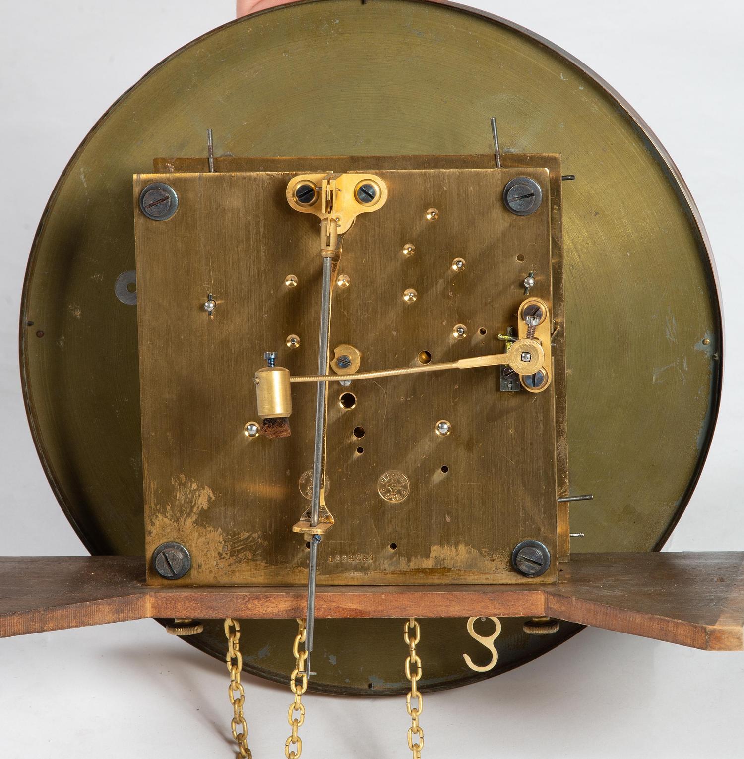 A Gustav Becker Oak Tall Case Clock