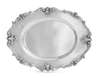 An American Silver Serving Tray, Frank M. Whiting & Co., North Attleboro, MA, having an S-scroll and foliate motif decorated rim.