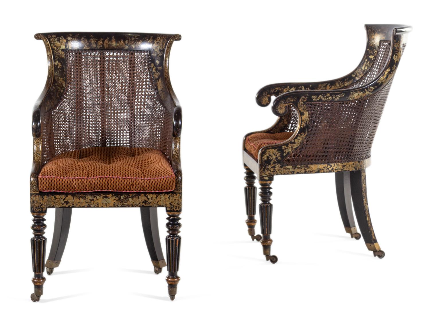 A Pair of William IV Parcel Gilt Japanned and Cane Upholstered Armchairs