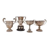A Group of Four English Silver Twin-Handled Trophies