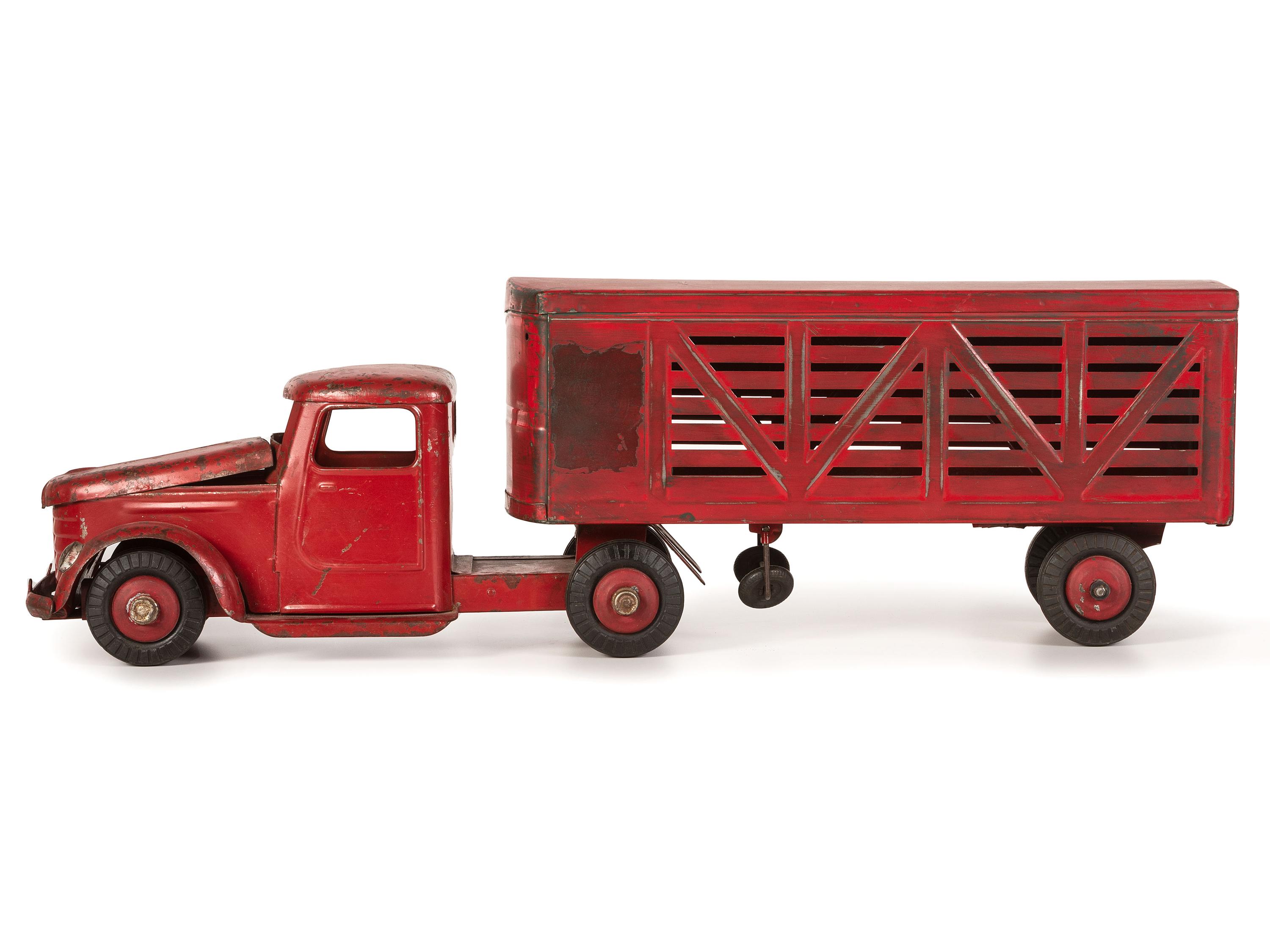 Five Pressed Metal Toy Trucks