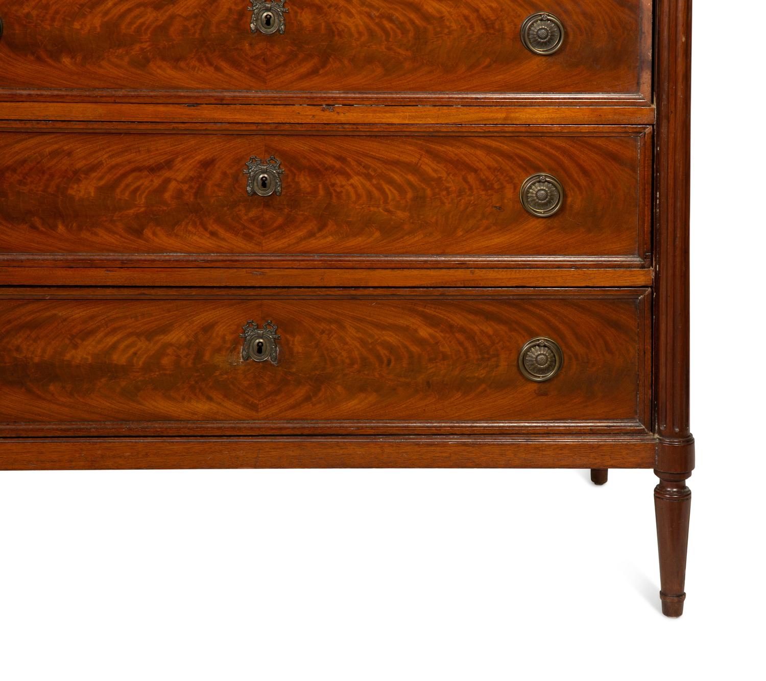 A Louis XVI Style Mahogany Commode