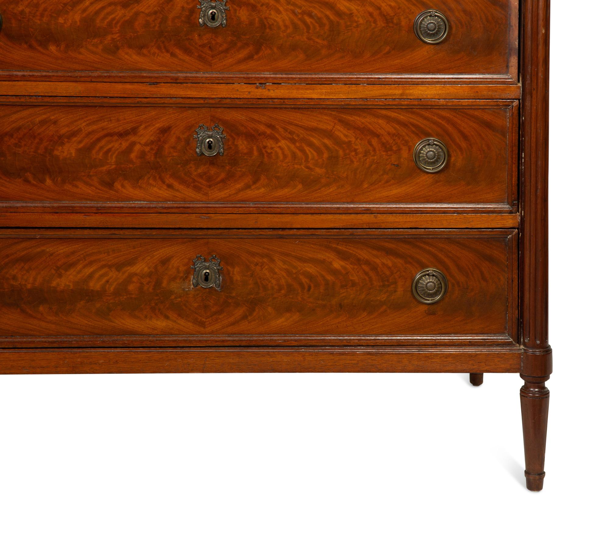 A Louis XVI Style Mahogany Commode