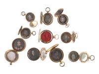 [EARLY PHOTOGRAPHY]. A group of 10 lockets containing 14 daguerreotypes of children and young men and women.