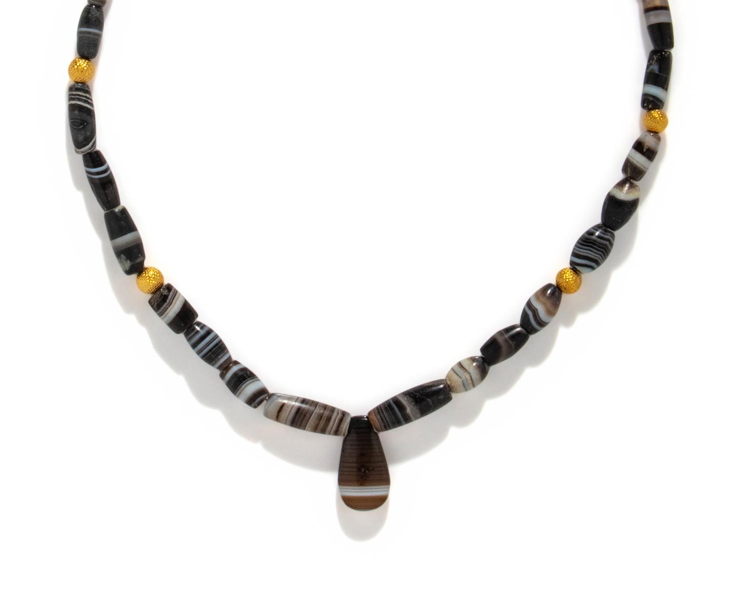 A Western Asiatic Banded Agate and Gold Bead Necklace
