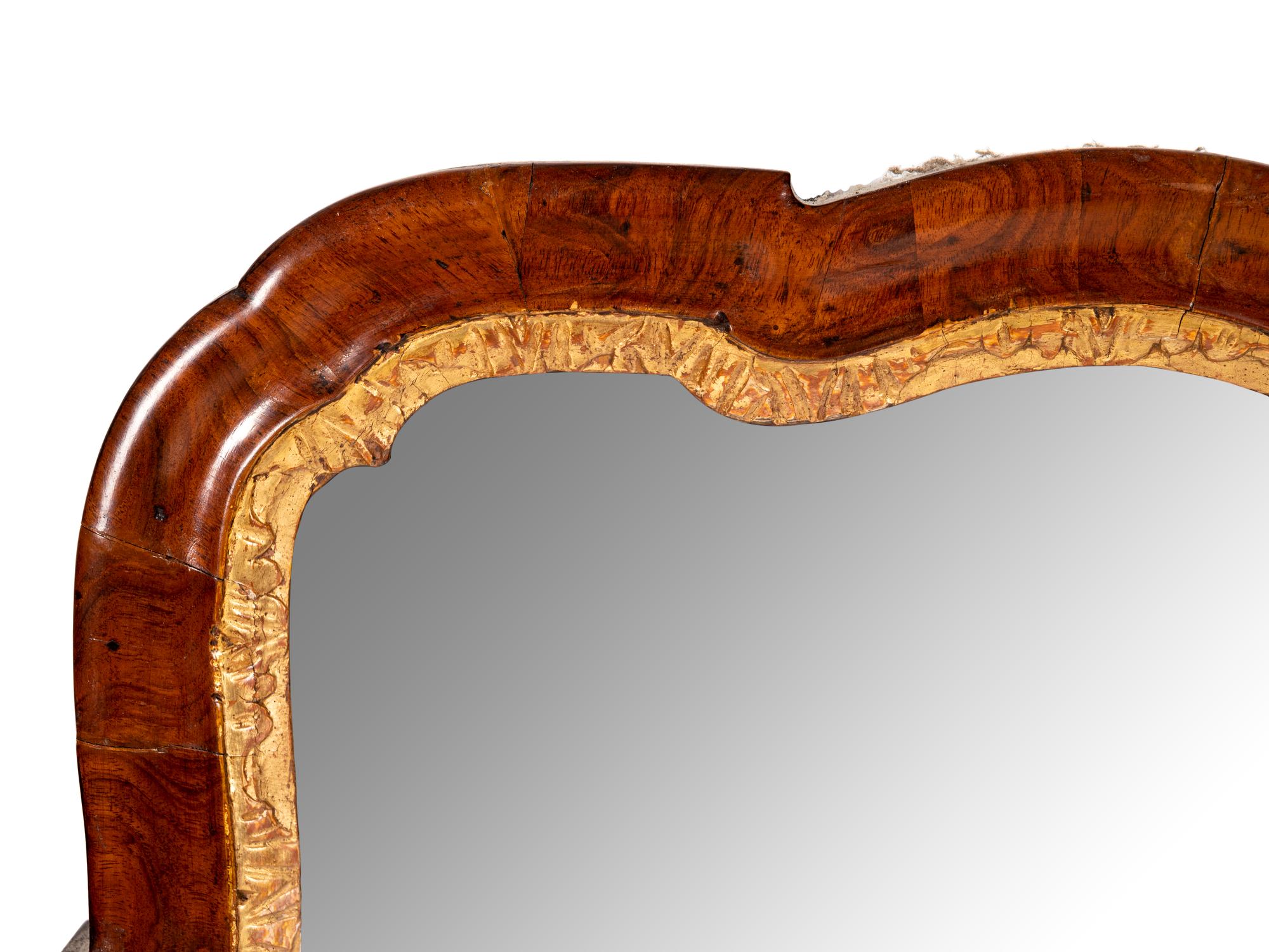 A George I Parcel Gilt Walnut Pier Mirror