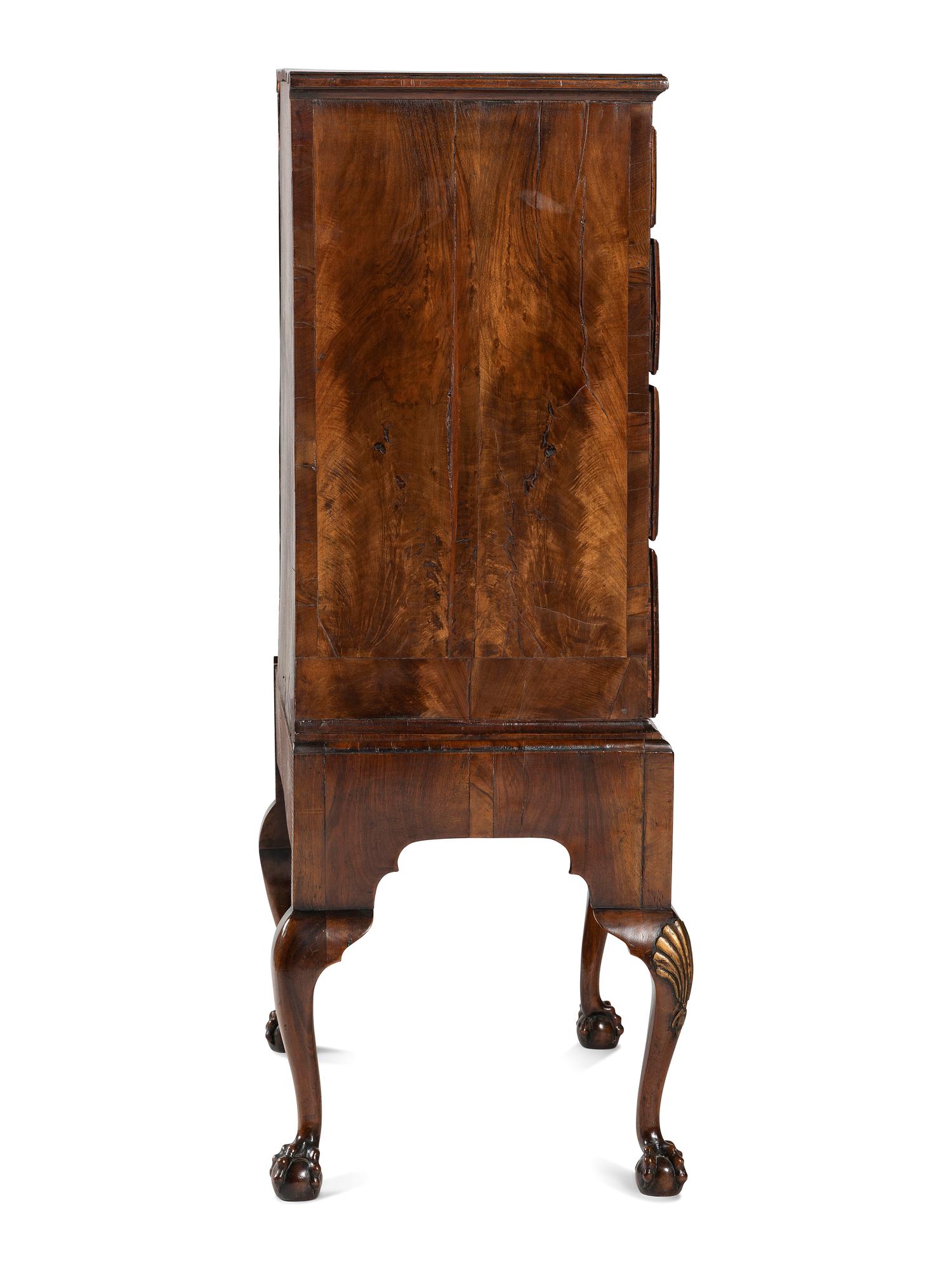 A George II Shell-Carved and Parcel Gilt Walnut-Veneered Chest-on-Stand