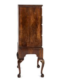 A George II Shell-Carved and Parcel Gilt Walnut-Veneered Chest-on-Stand