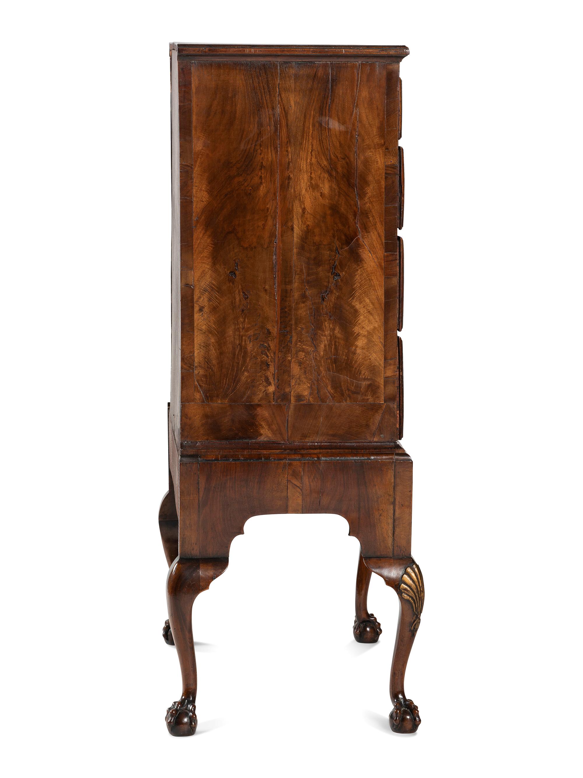 A George II Shell-Carved and Parcel Gilt Walnut-Veneered Chest-on-Stand