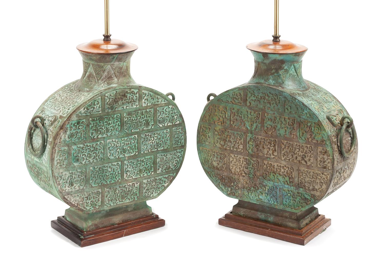 A Pair of Chinese Bronze Lamps Height 19 1/2 inches.