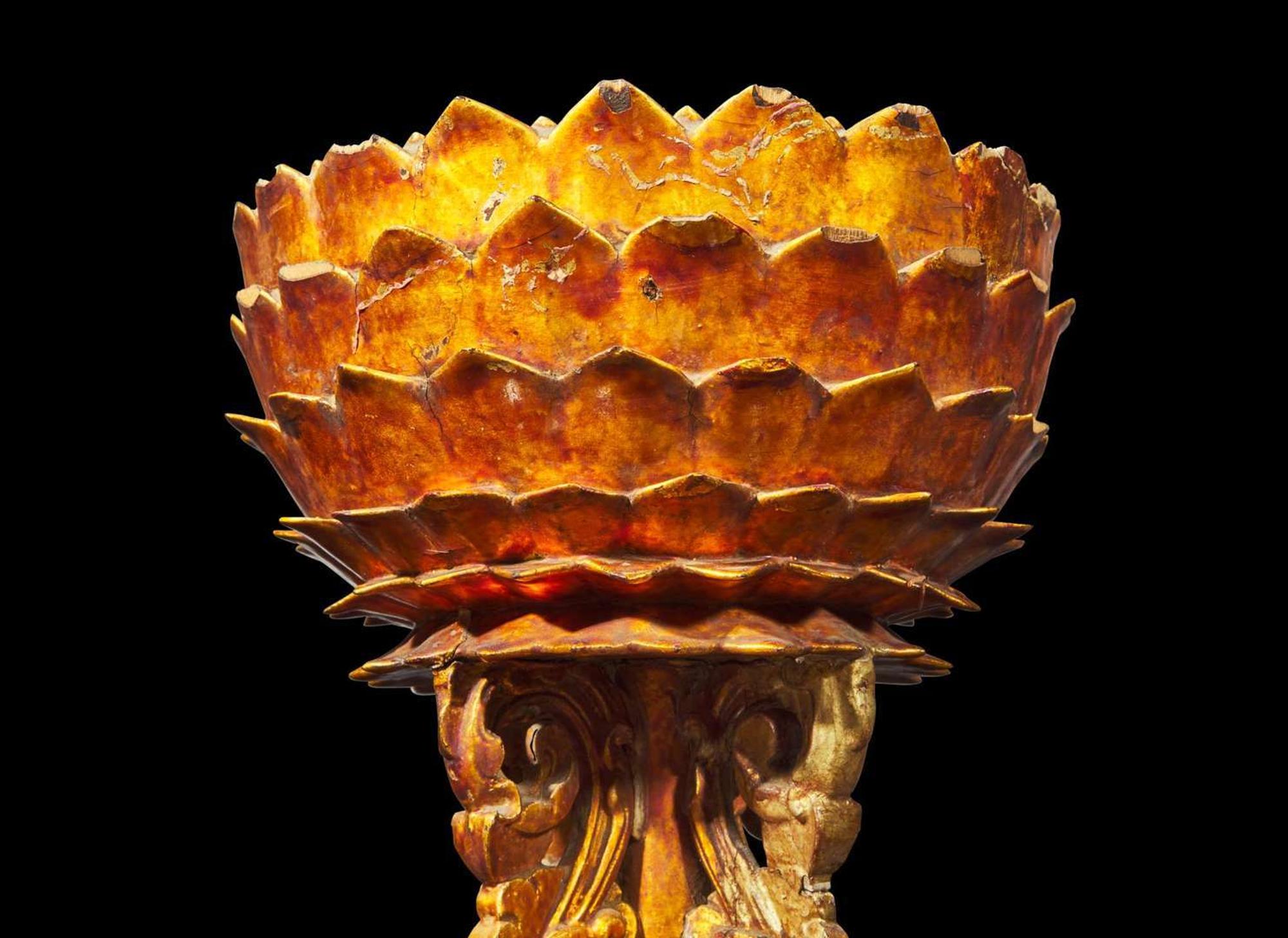 An associated pair of Chinese gilt-lacquered "Lotus" altar stands, Qing dynasty, 18th century or later 漆金蓮花燭臺或一對 清 十八世紀或更晚