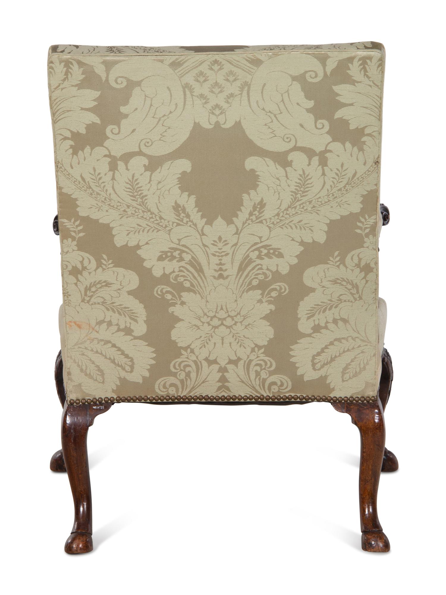 A George II Carved Mahogany Library Chair