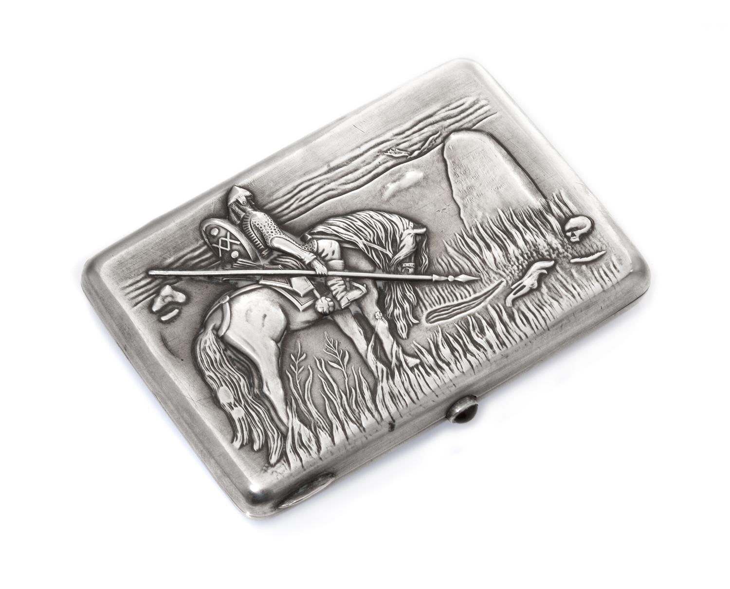 A Russian Silver Cigarette Case, Maker's mark Cyrillic GE, Moscow, the lid worked to show a warrior on horseback mourning at a gravesto