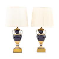 A Pair of Continental Porcelain Vases Mounted as Lamps