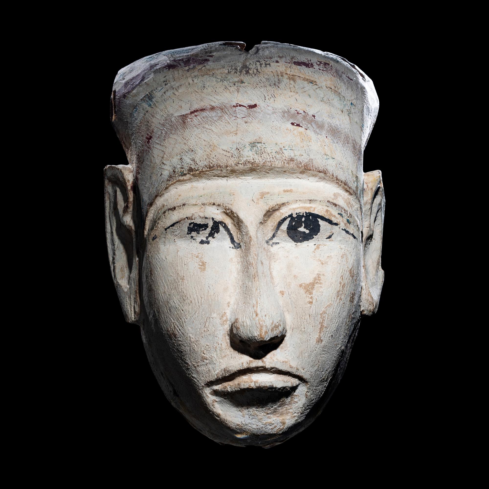 An Egyptian Wood Mummy Mask