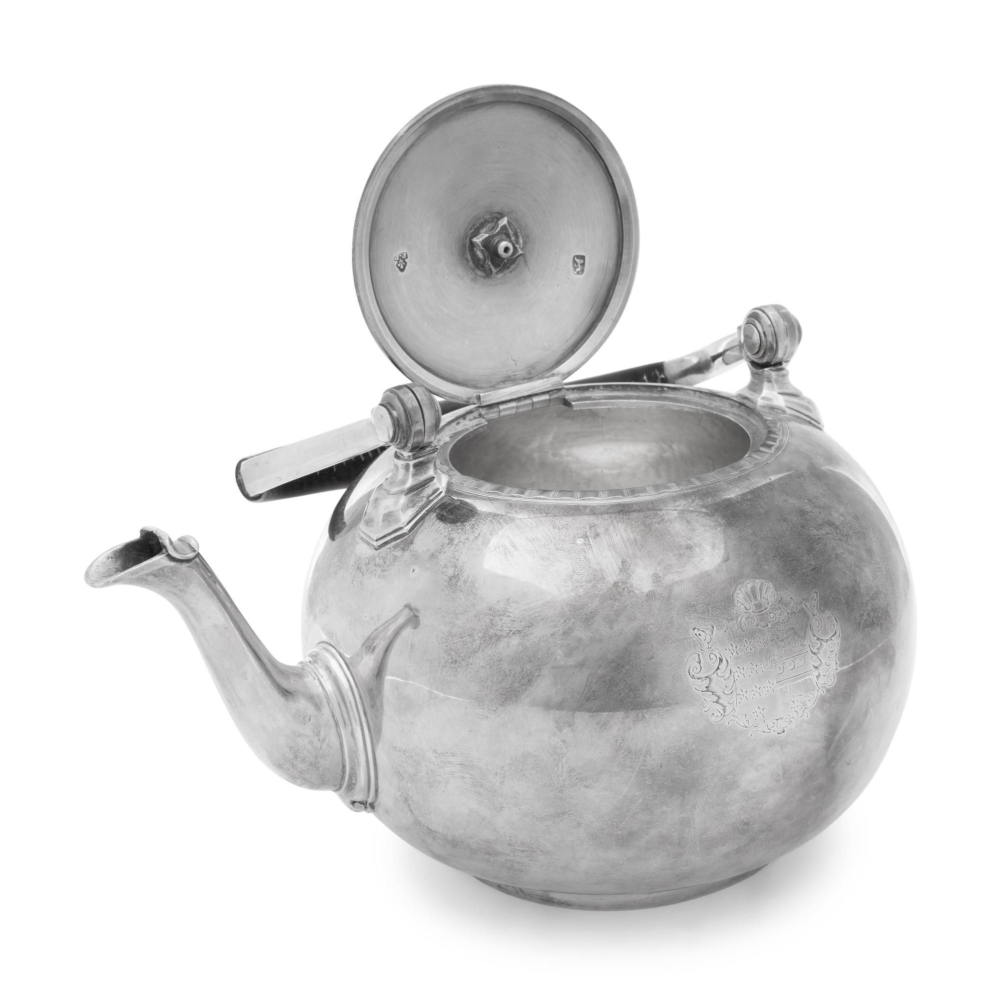An 18th Century English Silver Tea Kettle