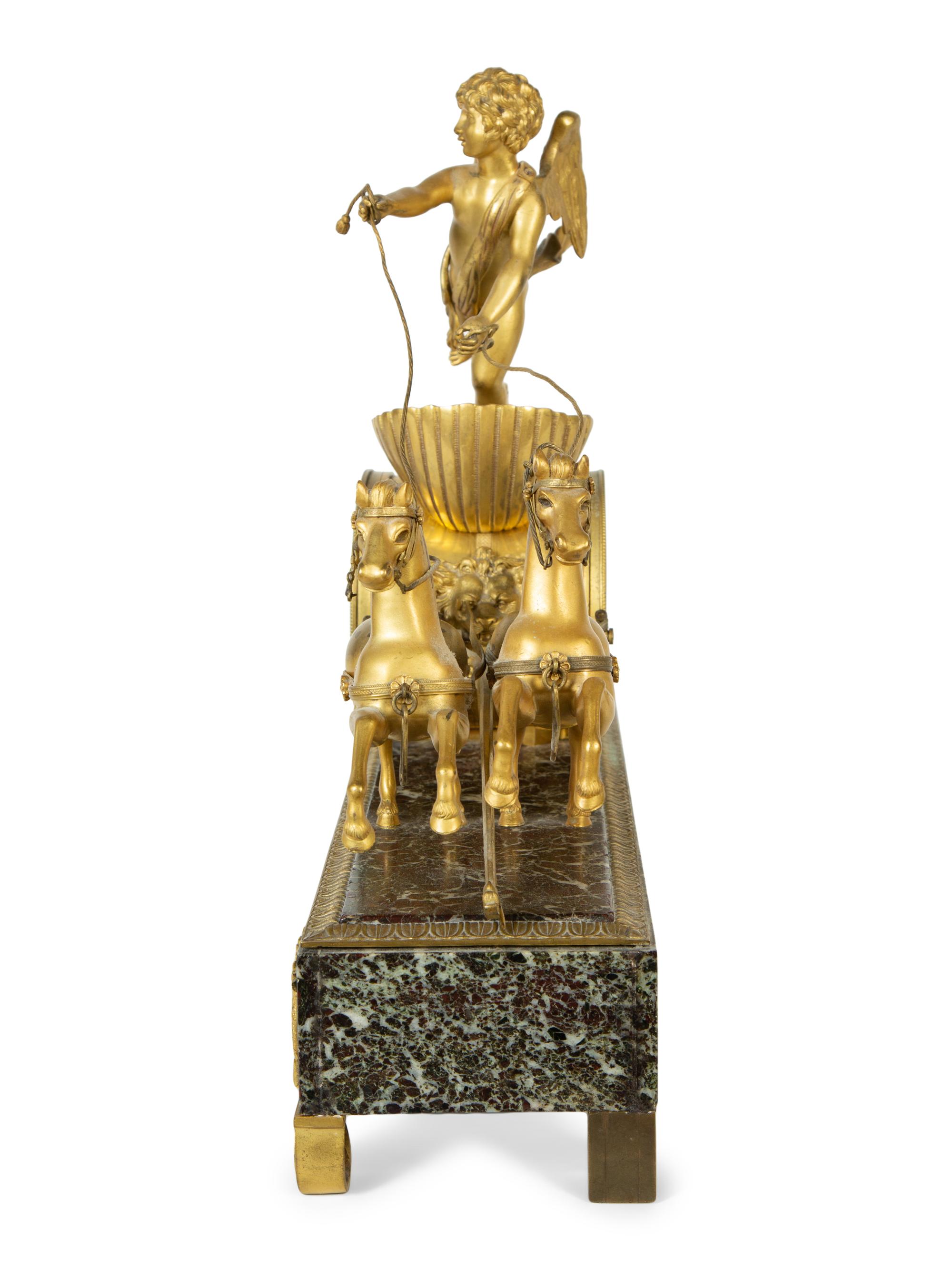 A French Gilt Bronze and Marble Mantel Clock