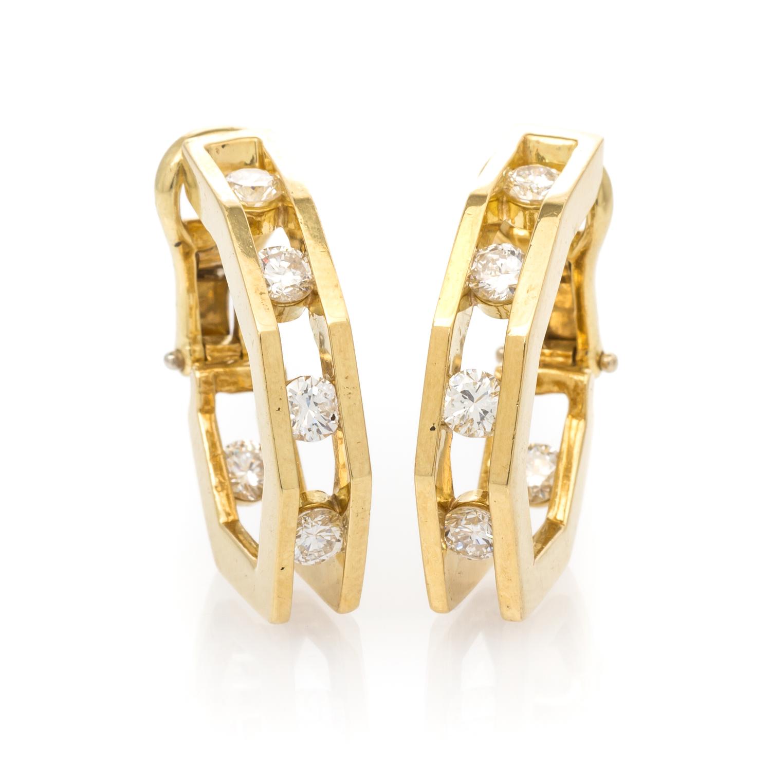 A Pair of 18 Karat Yellow Gold and Diamond Earclips, 11.80 dwts.