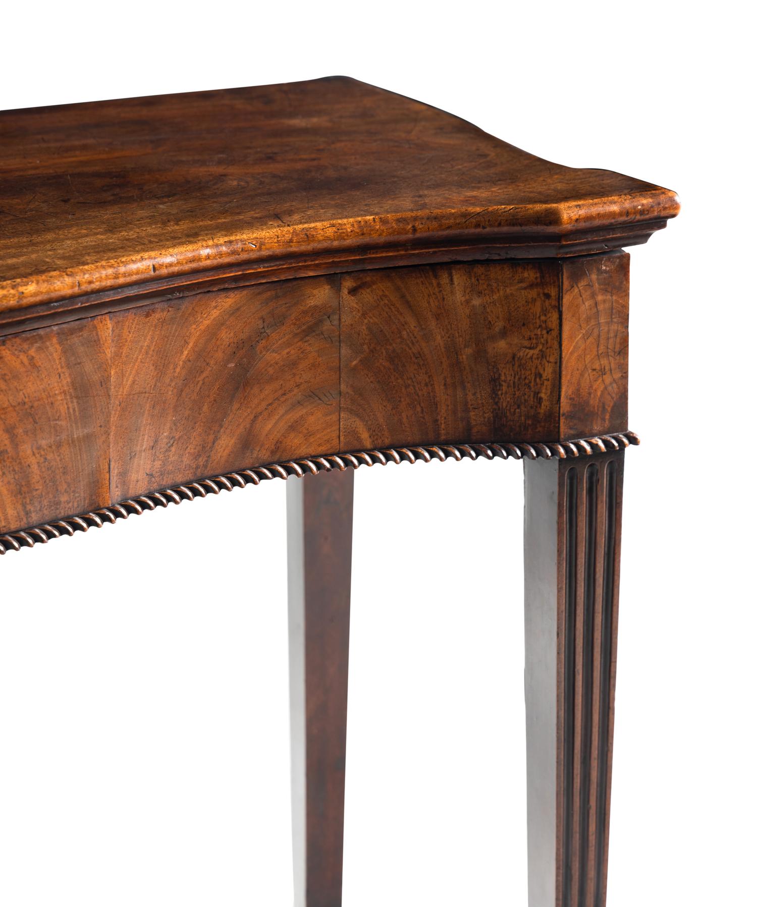 A George III Mahogany Serpentine Sideboard