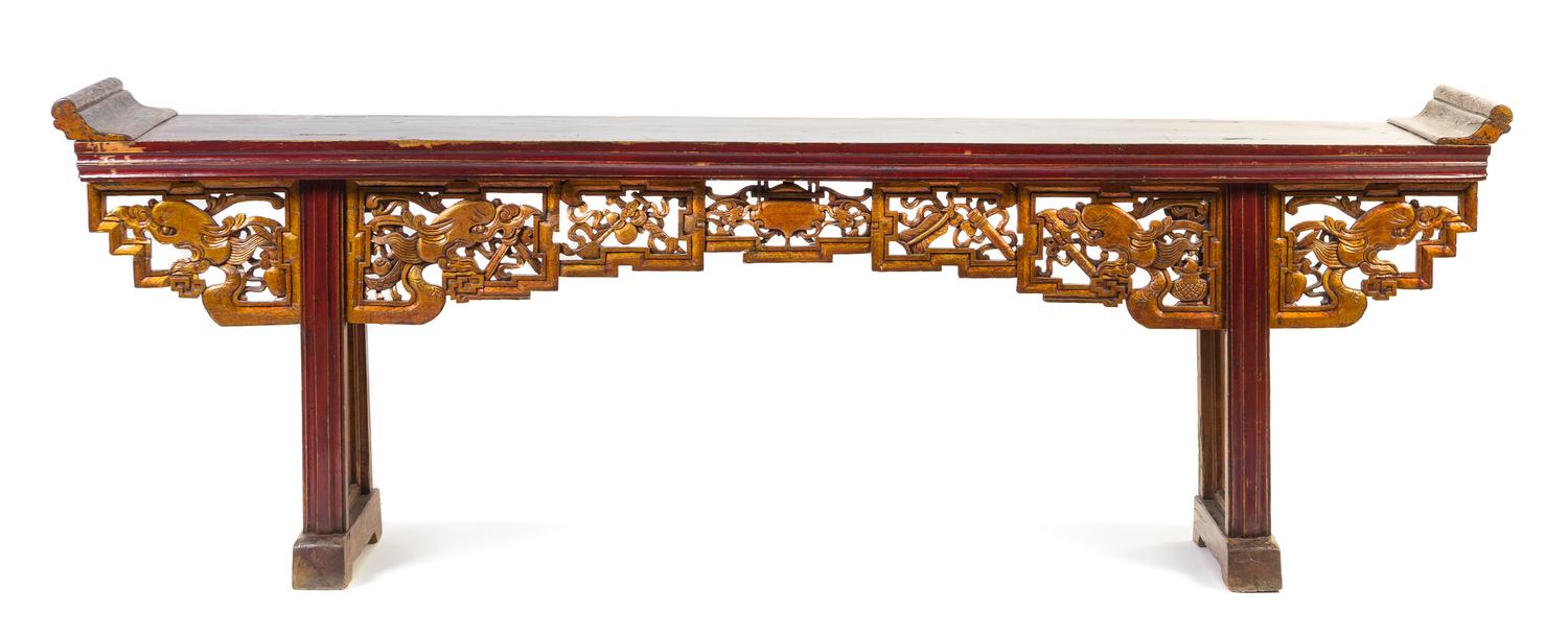 A Gilt and Red Lacquered Elmwood Altar Table Height 37 1/2 x width 109 1/2 x depth 18 1/2 inches.