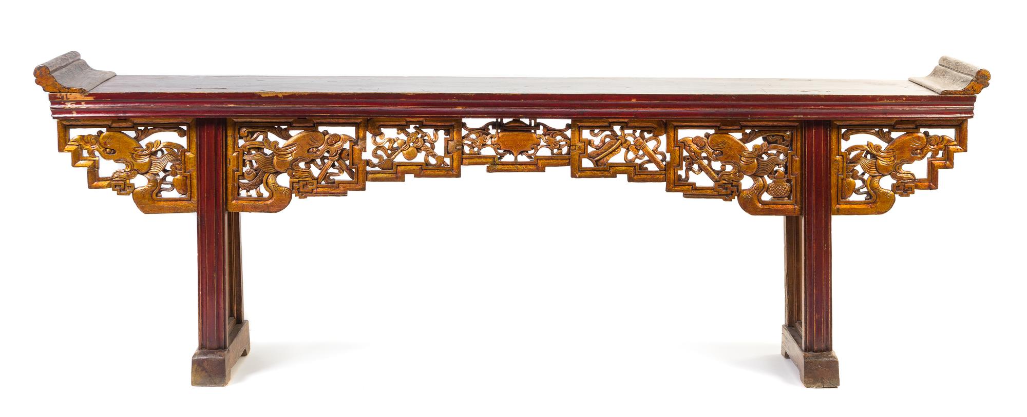 A Gilt and Red Lacquered Elmwood Altar Table Height 37 1/2 x width 109 1/2 x depth 18 1/2 inches.