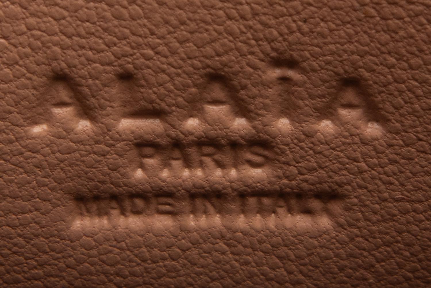 ALAÏA, LASER-CUT LEATHER CLUTCH