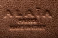 ALAÏA, LASER-CUT LEATHER CLUTCH