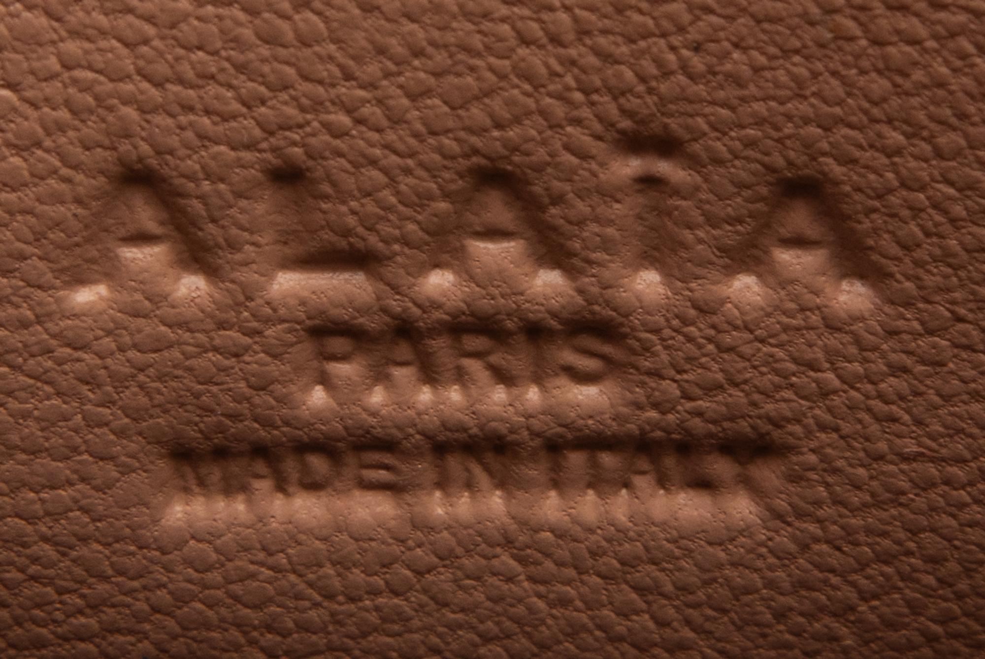 ALAÏA, LASER-CUT LEATHER CLUTCH