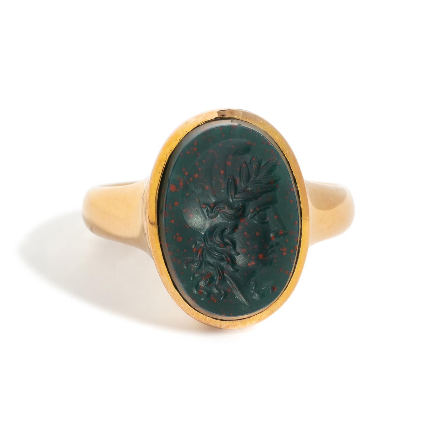 A Neoclassical Gold and Bloodstone Finger Ring with a Female Portrait Head Wearing a Phrygian Cap (Symbol of Liberty)