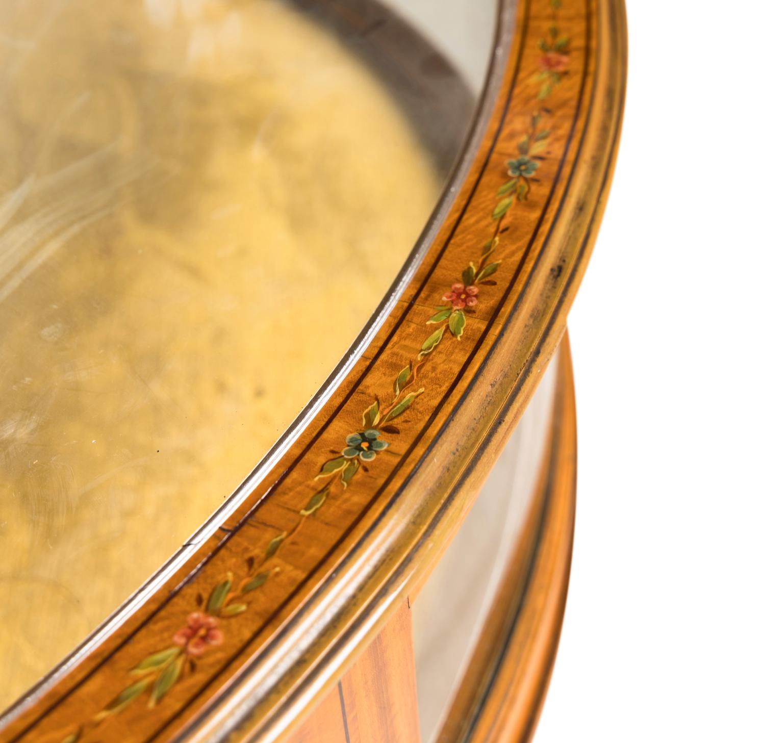 An Edwardian Satinwood and Paint Decorated Demilune Vitrine Table