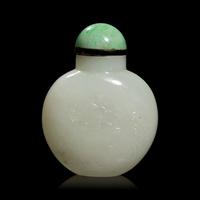 A Chinese Carved White Jade Snuff Bottle, 19th Century