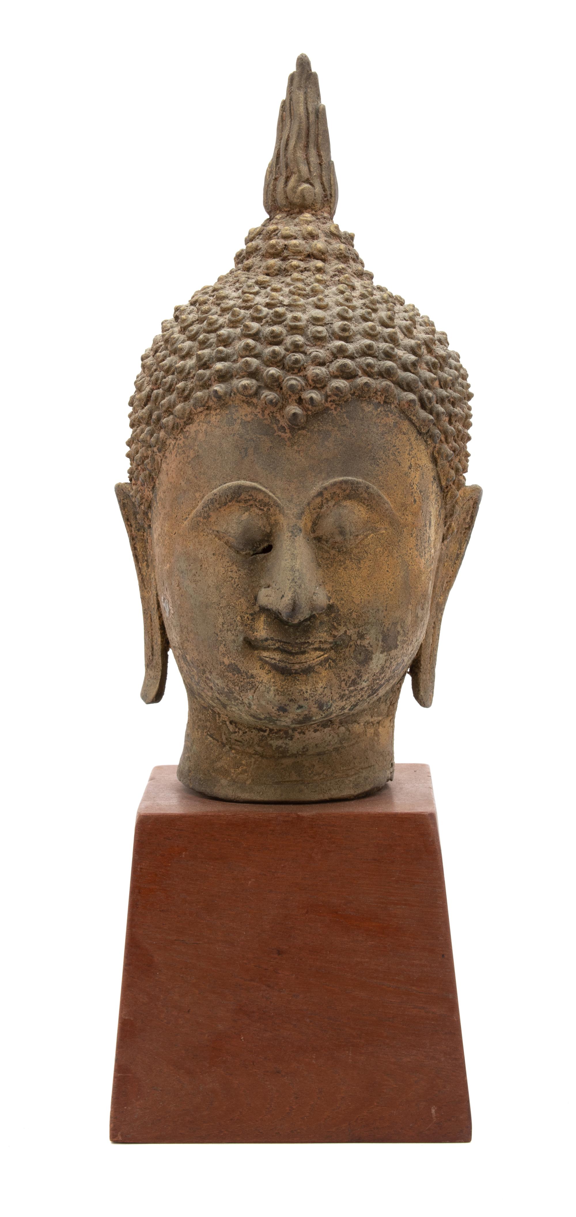 A Thai Parcel Gilt Bronze Head of Buddha — 19TH CENTURY