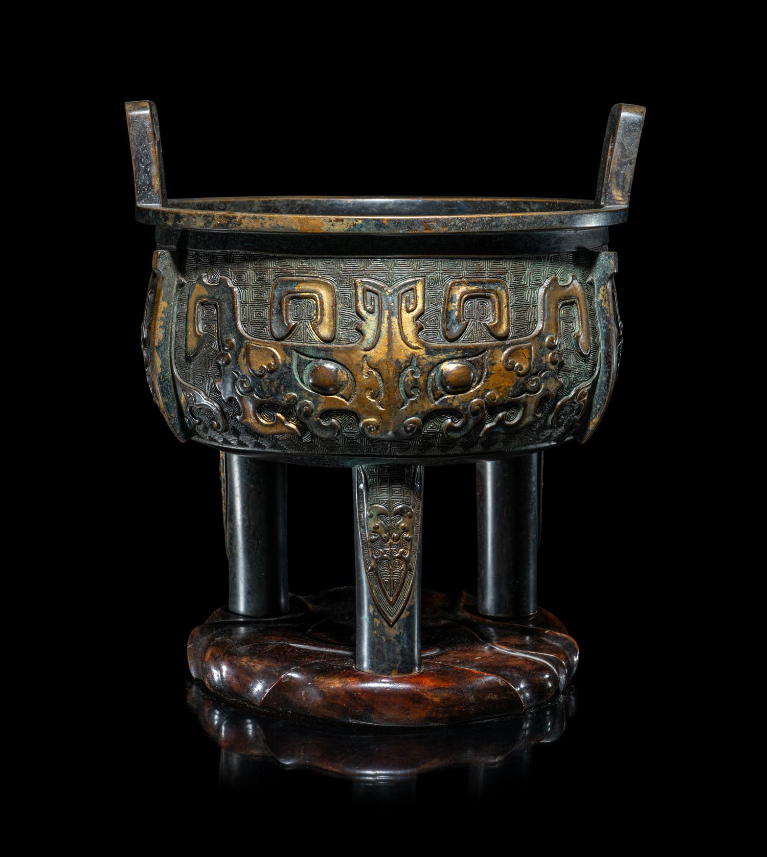 A Chinese Parcel Gilt Archaistic Bronze Bronze Ding Vessel