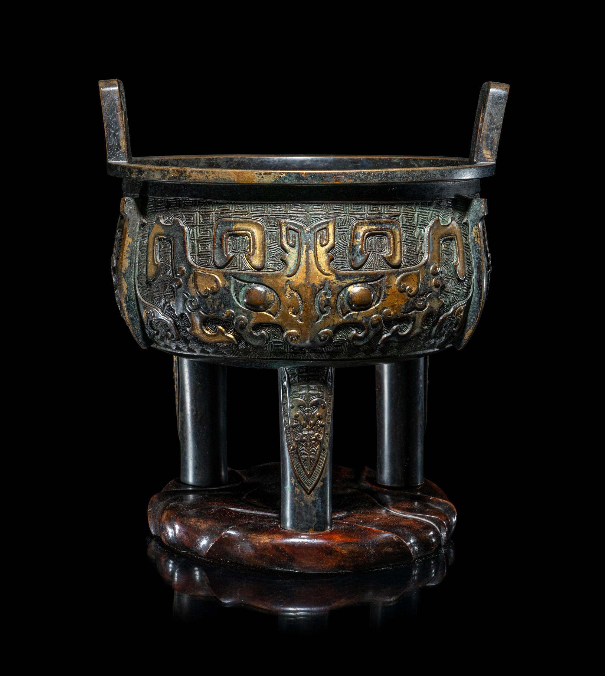 A Chinese Parcel Gilt Archaistic Bronze Bronze Ding Vessel