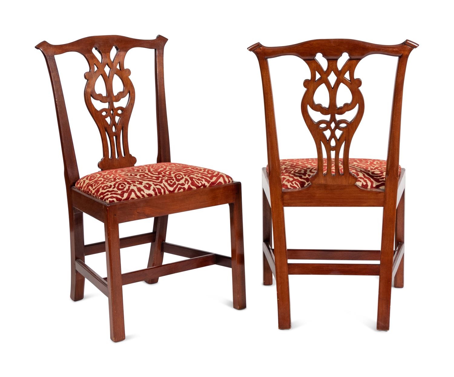 A Set of Twelve Joseph Gaar Dining Chairs