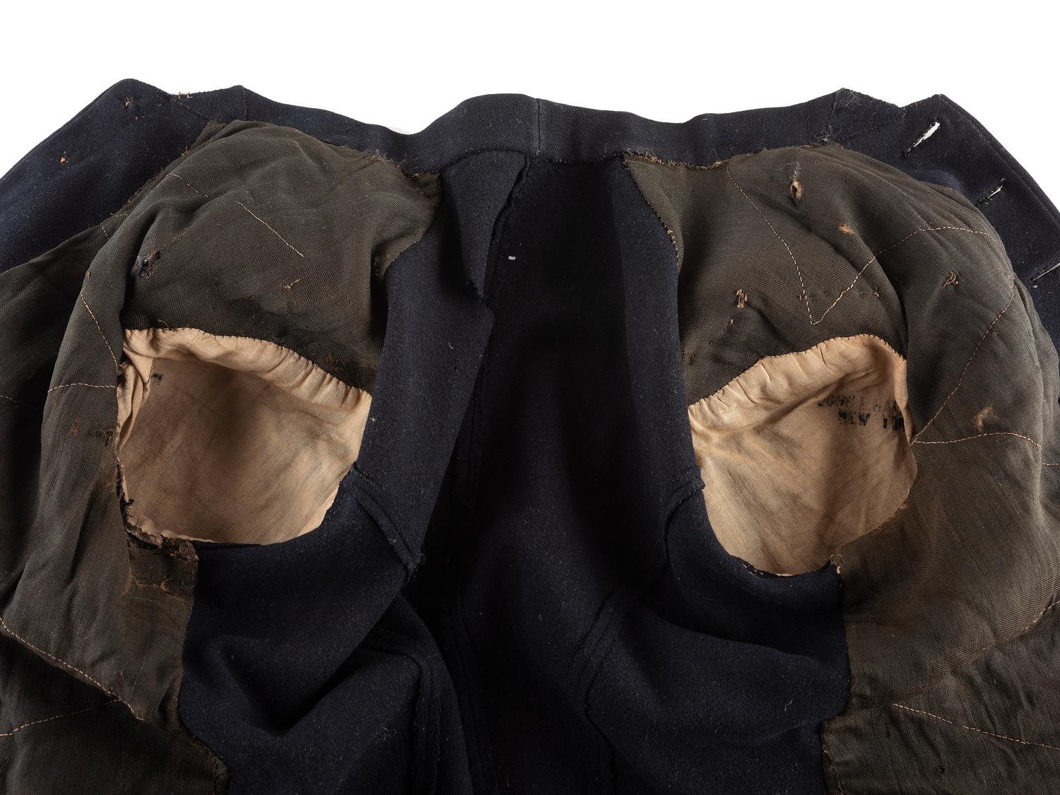 [CIVIL WAR]. A collection of items attributed to Thomas W. Johnson, Co. K, 4th Delaware Infantry, incl. frock coat, cap, belt rig, and cartridge box.
