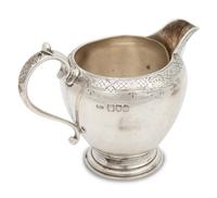 An English Silver Creamer and Sugar