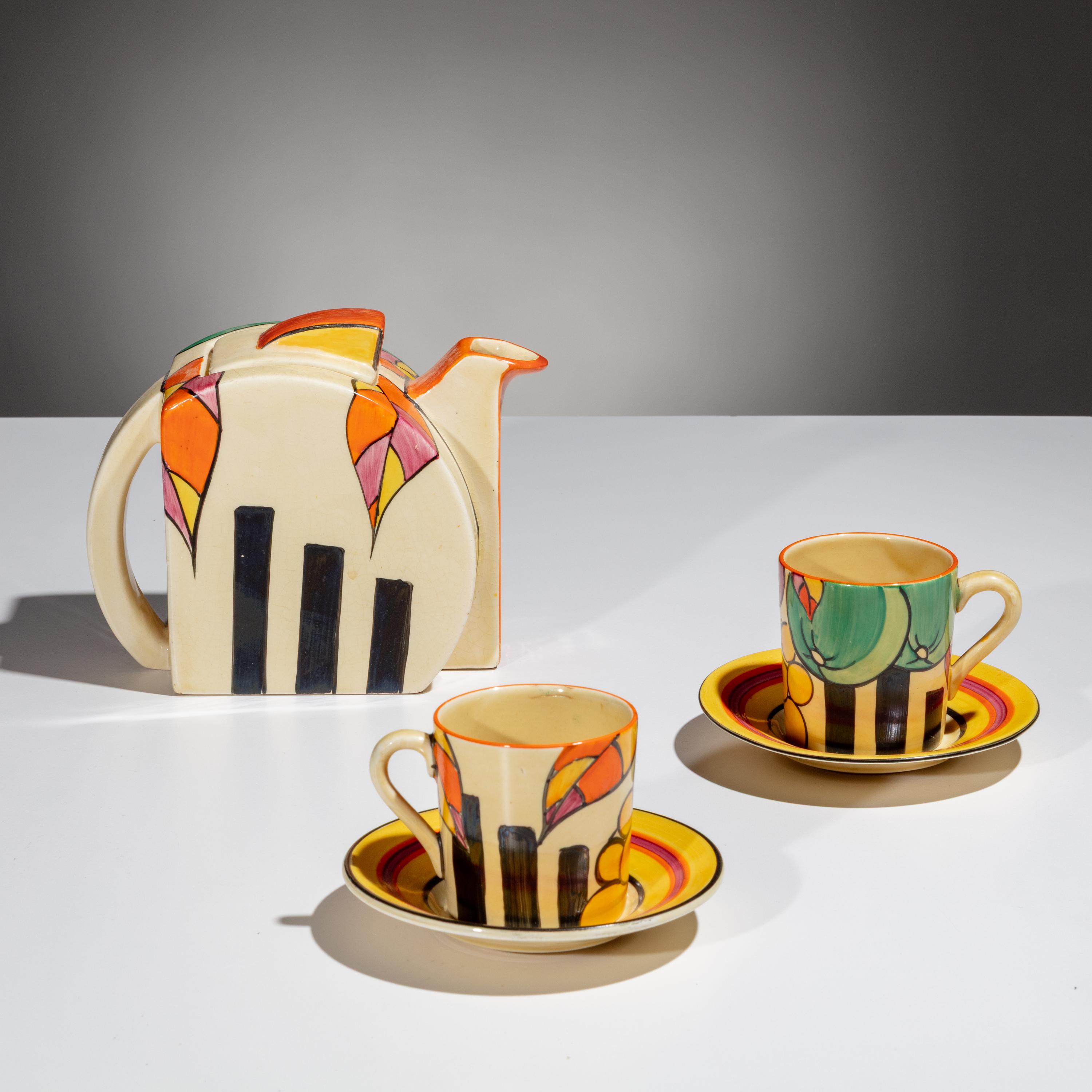 Clarice Cliff (English, 1899–1972) — Apples pattern Teapot and Two Cups w/ saucers, 5 pieces